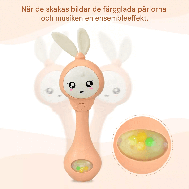 Baby's muziek knipperende rammelaar