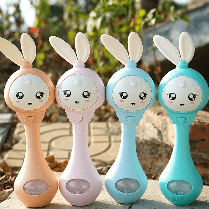 Baby's muziek knipperende rammelaar