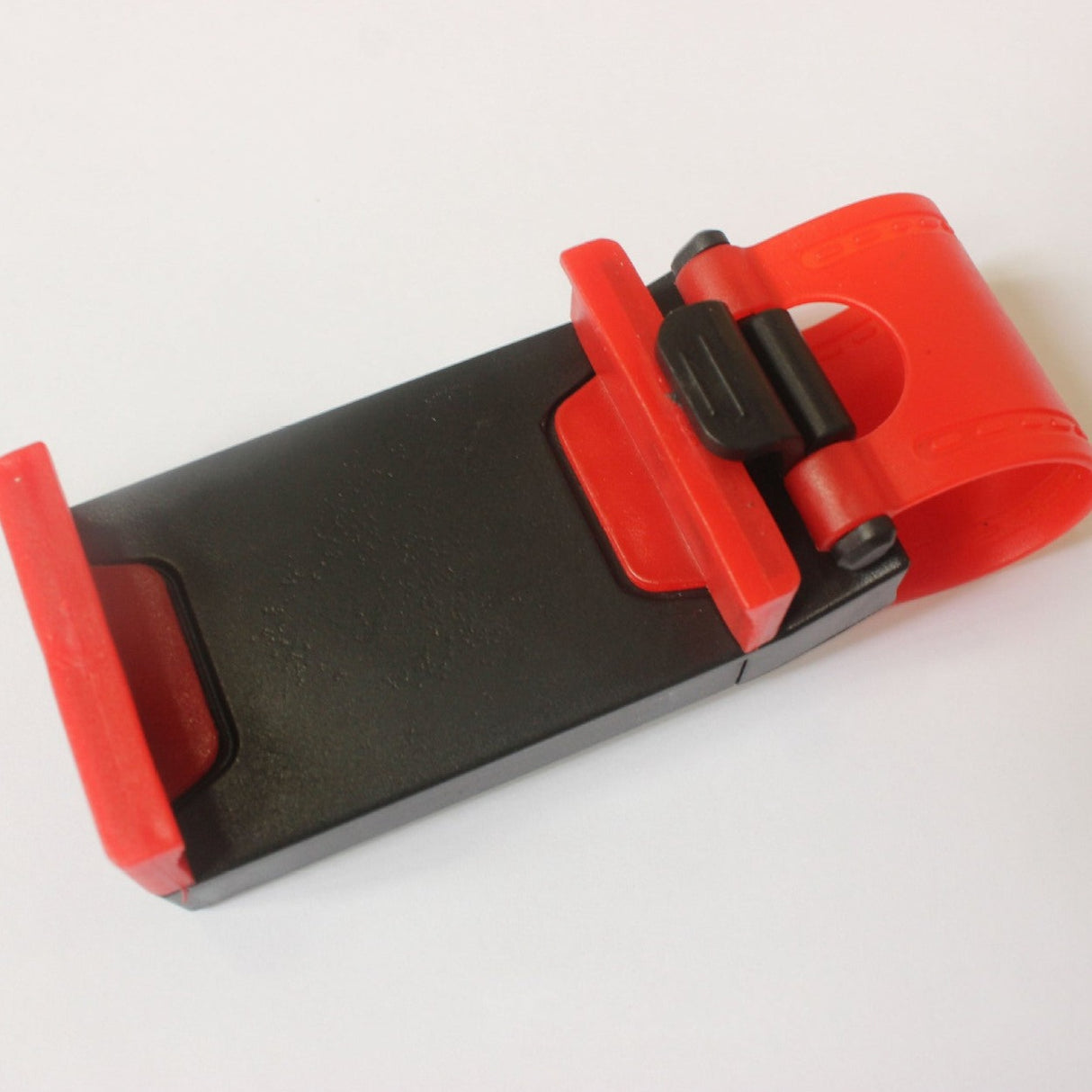 Universele houder voor mobiele telefoon aan het stuur